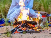 ضبط مخالف لنظام البيئة لإشعاله النار في أراضي الغطاء النباتي